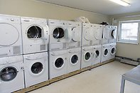 Laundry room with several laundry machines
